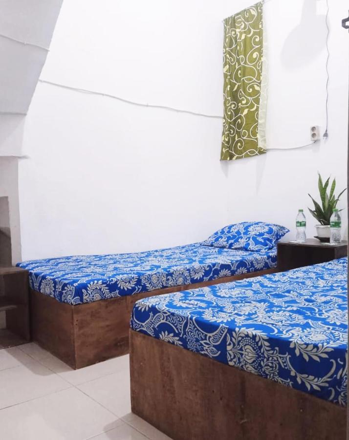 Greenkost Hostel Sintang Buitenkant foto
